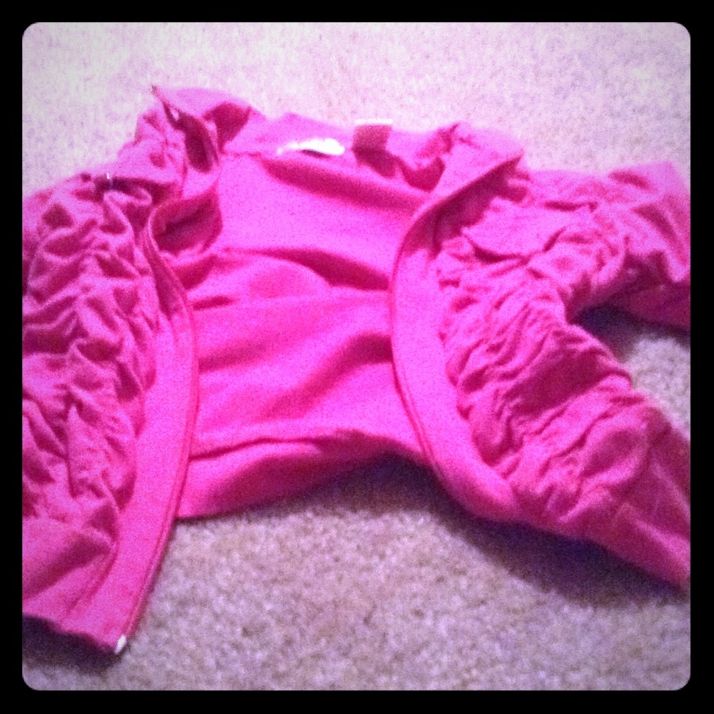 A pink sweater